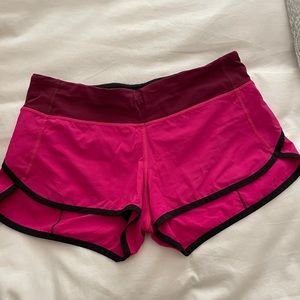 Pink lululemon running shorts